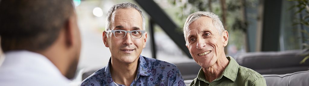 Two men meeting with doctor